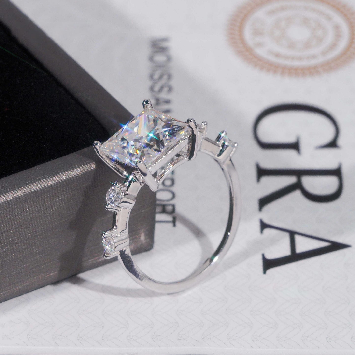.925 SILVER PRINCESS CUT MOISSANITE ENGAGEMENT RING WITH ROUND SIDE STONES VTRG1010