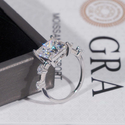 .925 SILVER PRINCESS CUT MOISSANITE ENGAGEMENT RING WITH ROUND SIDE STONES VTRG1010