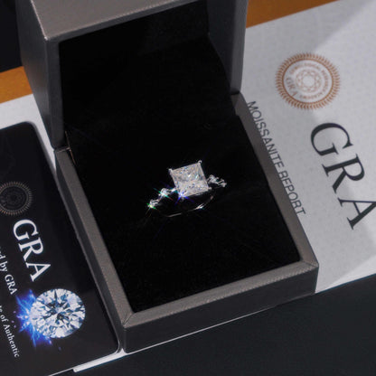 .925 SILVER PRINCESS CUT MOISSANITE ENGAGEMENT RING WITH ROUND SIDE STONES VTRG1010