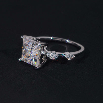 .925 SILVER PRINCESS CUT MOISSANITE ENGAGEMENT RING WITH ROUND SIDE STONES VTRG1010