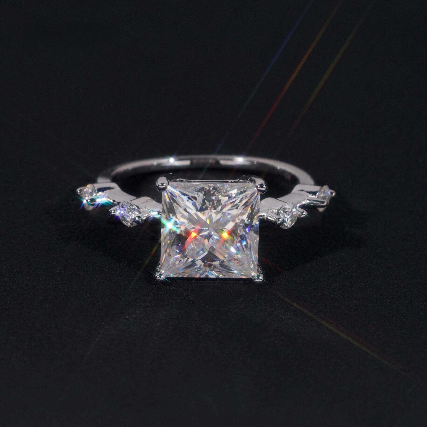 .925 SILVER PRINCESS CUT MOISSANITE ENGAGEMENT RING WITH ROUND SIDE STONES VTRG1010