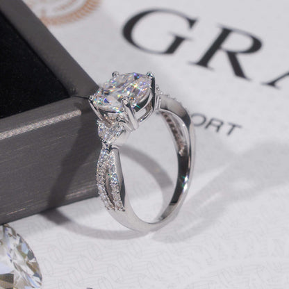 .925 SILVER ROUND BRILLIANT CUT MOISSANITE ENGAGEMENT RING WITH MARQUISE SIDE STONES VTRG1011